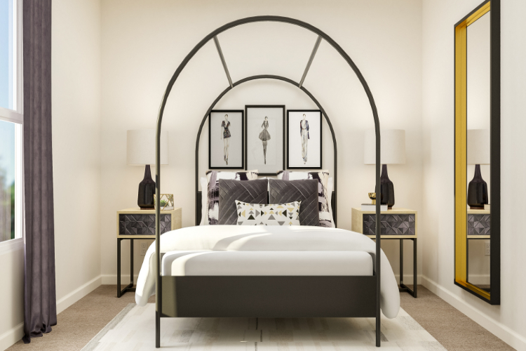 A bedroom with a large mirror.