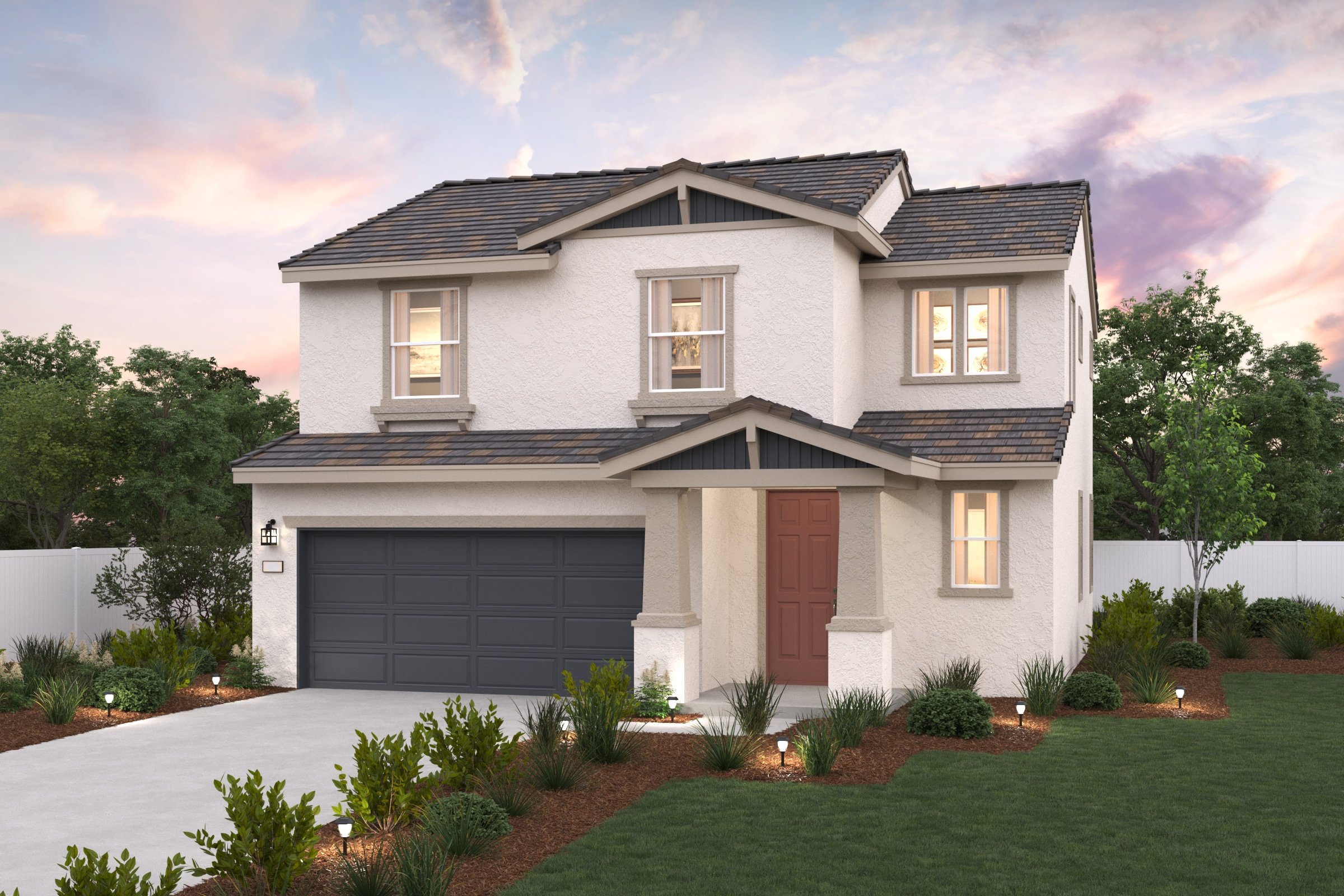 A white house with a garage.