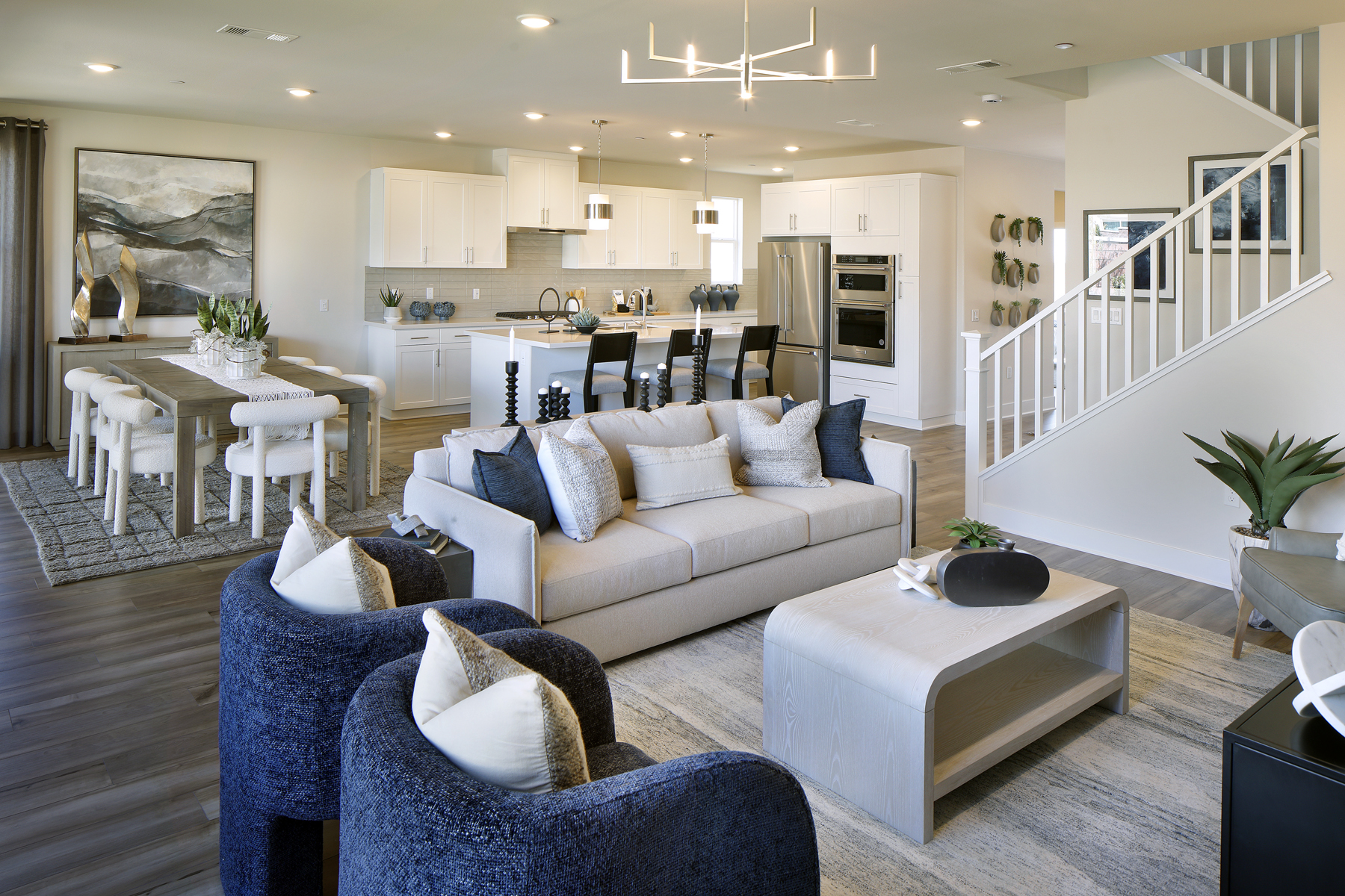 A living room with a couch and a table.