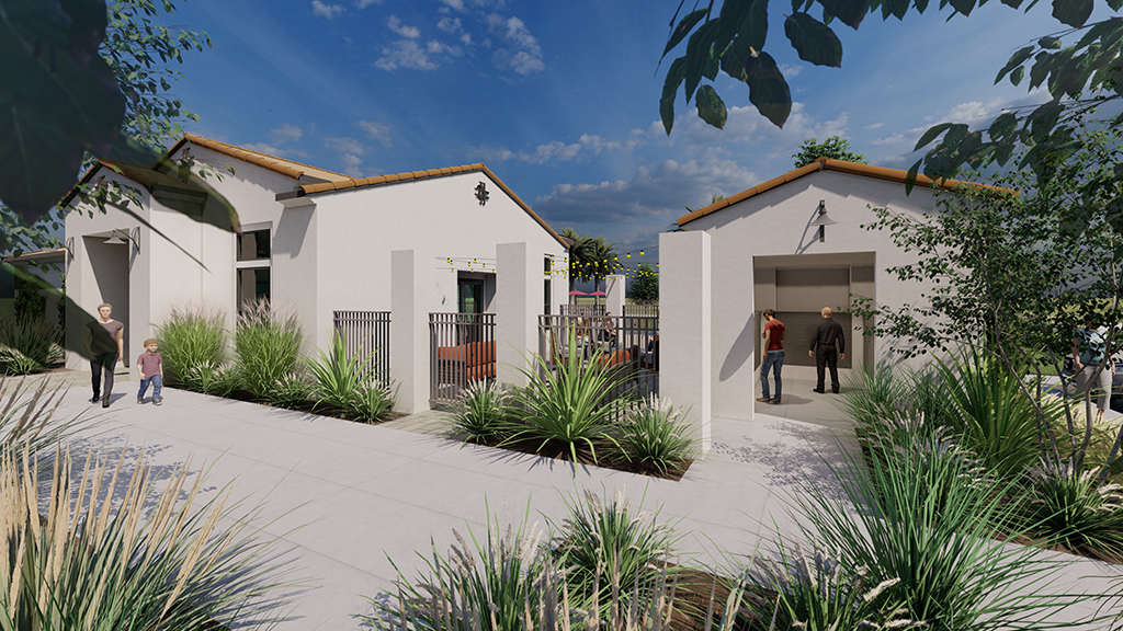 A group of people walking outside of a building.