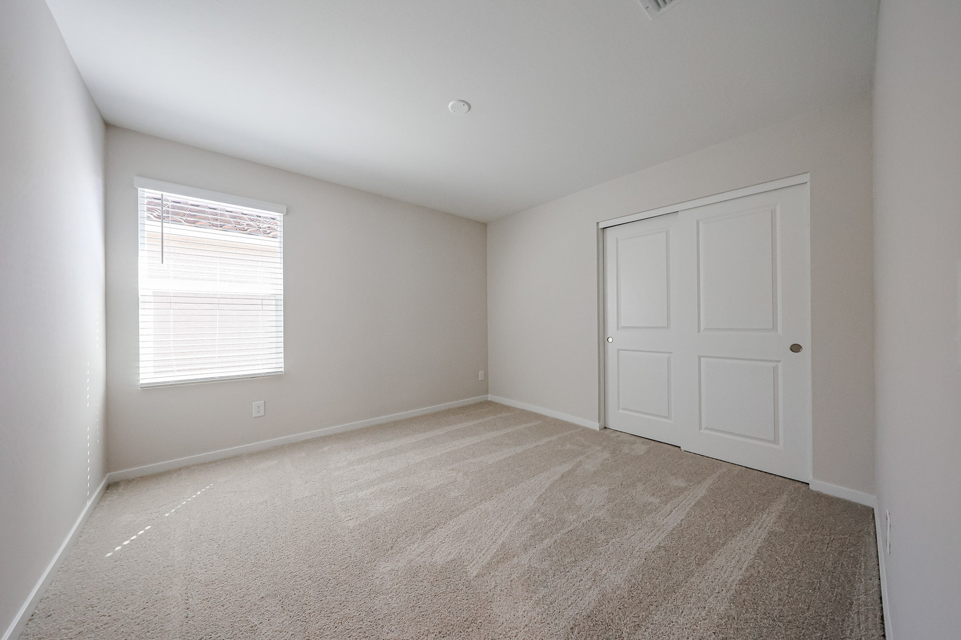 A room with white doors.