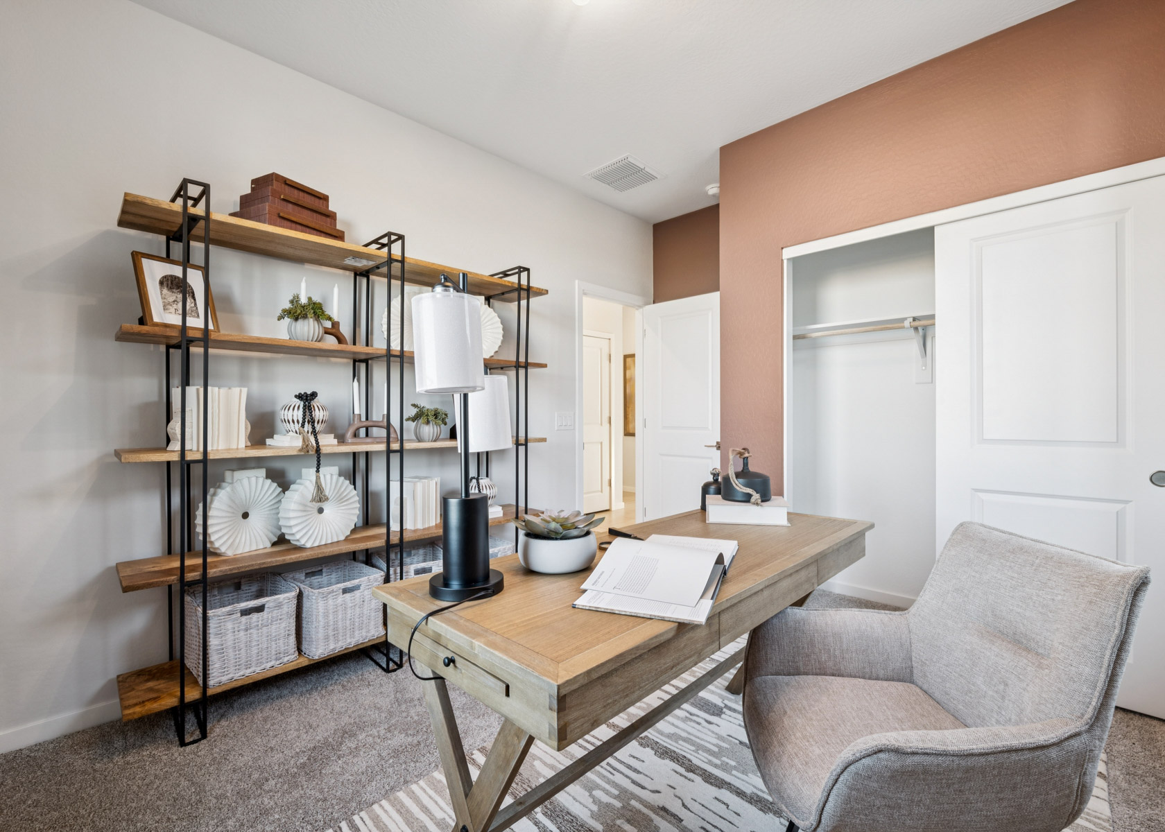 A room with a table and chairs.