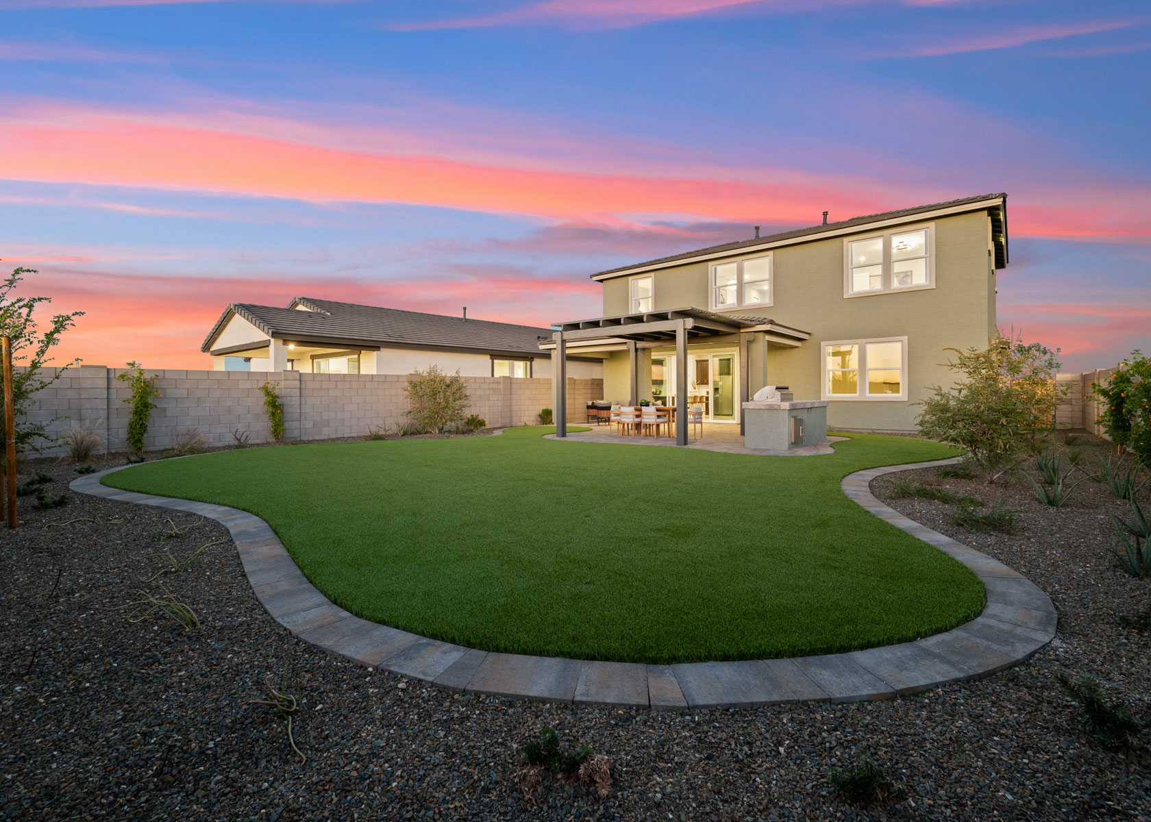 A house with a large front yard.