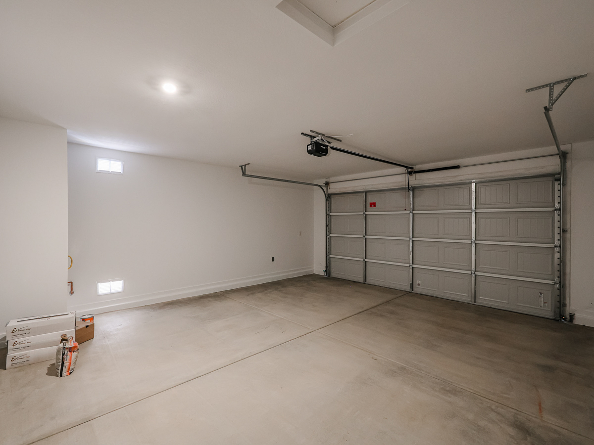 A room with a metal gate.