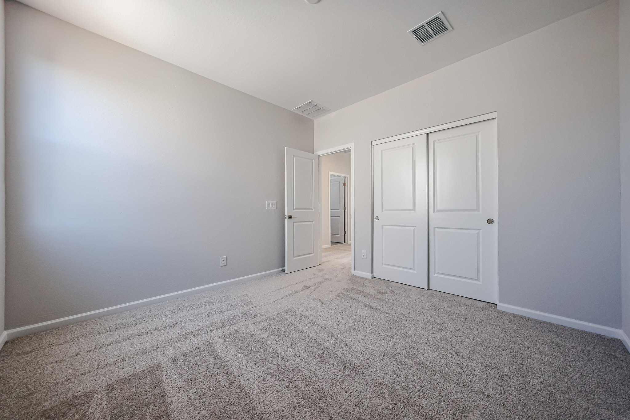 A room with white doors.