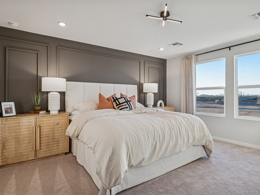 A bedroom with a large bed.