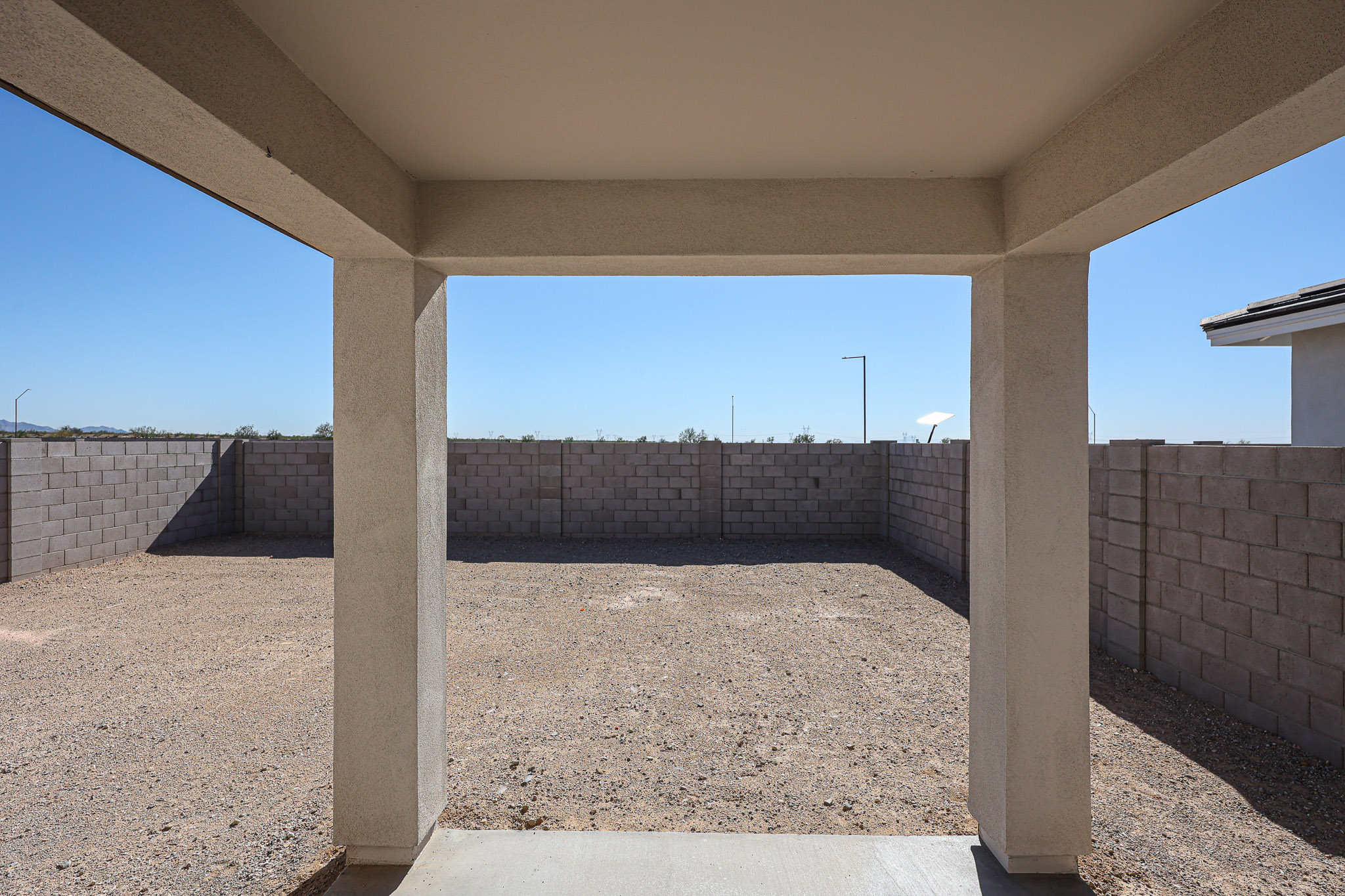A concrete structure with pillars.