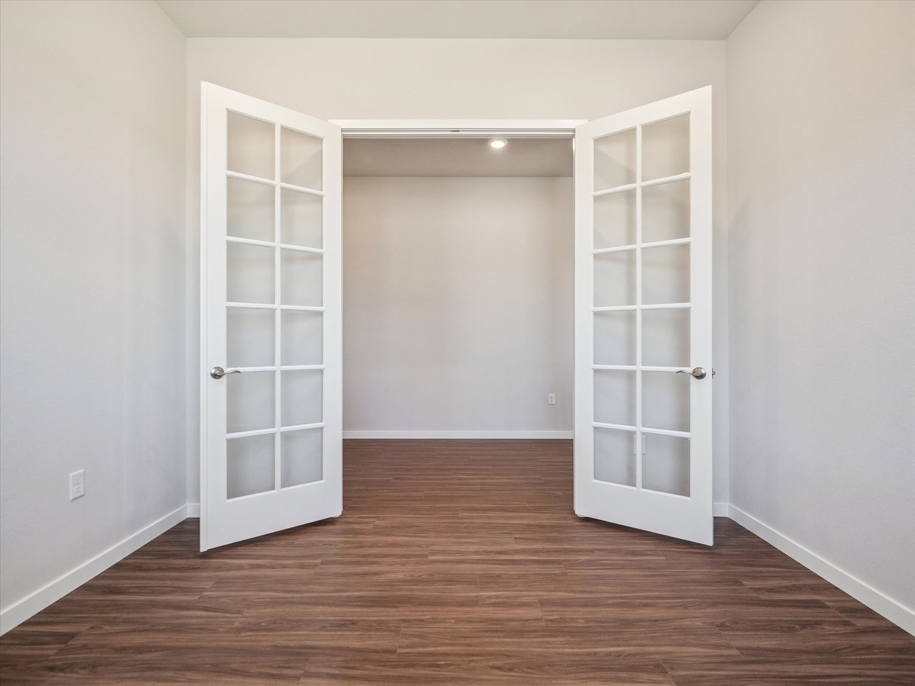 A room with white doors.