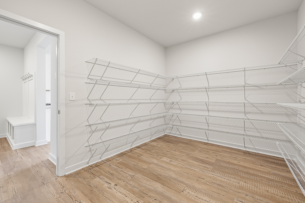 A white staircase in a room.