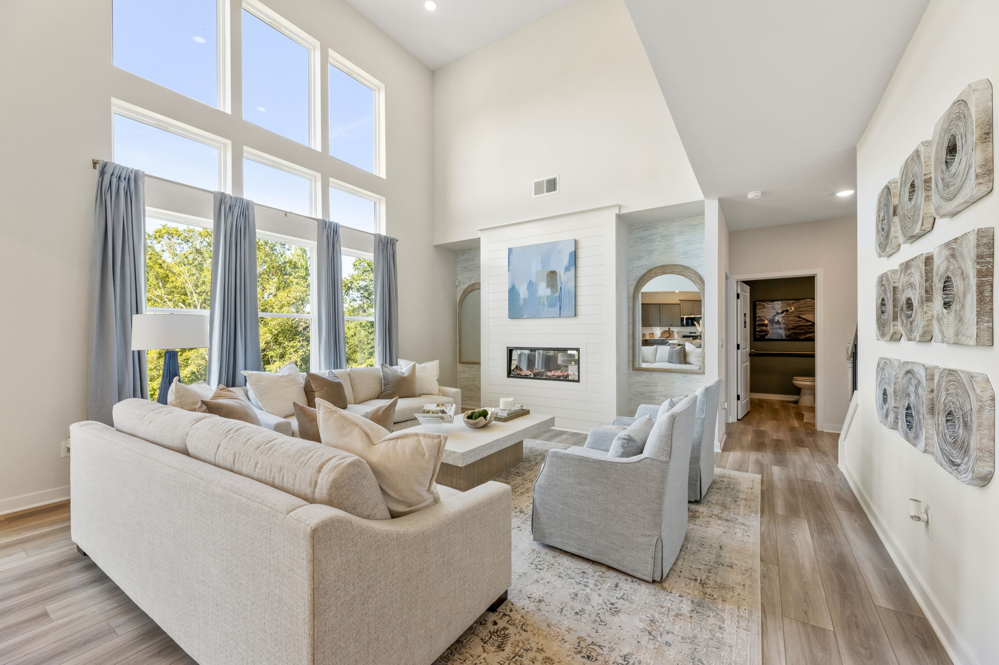 A living room with a large window.