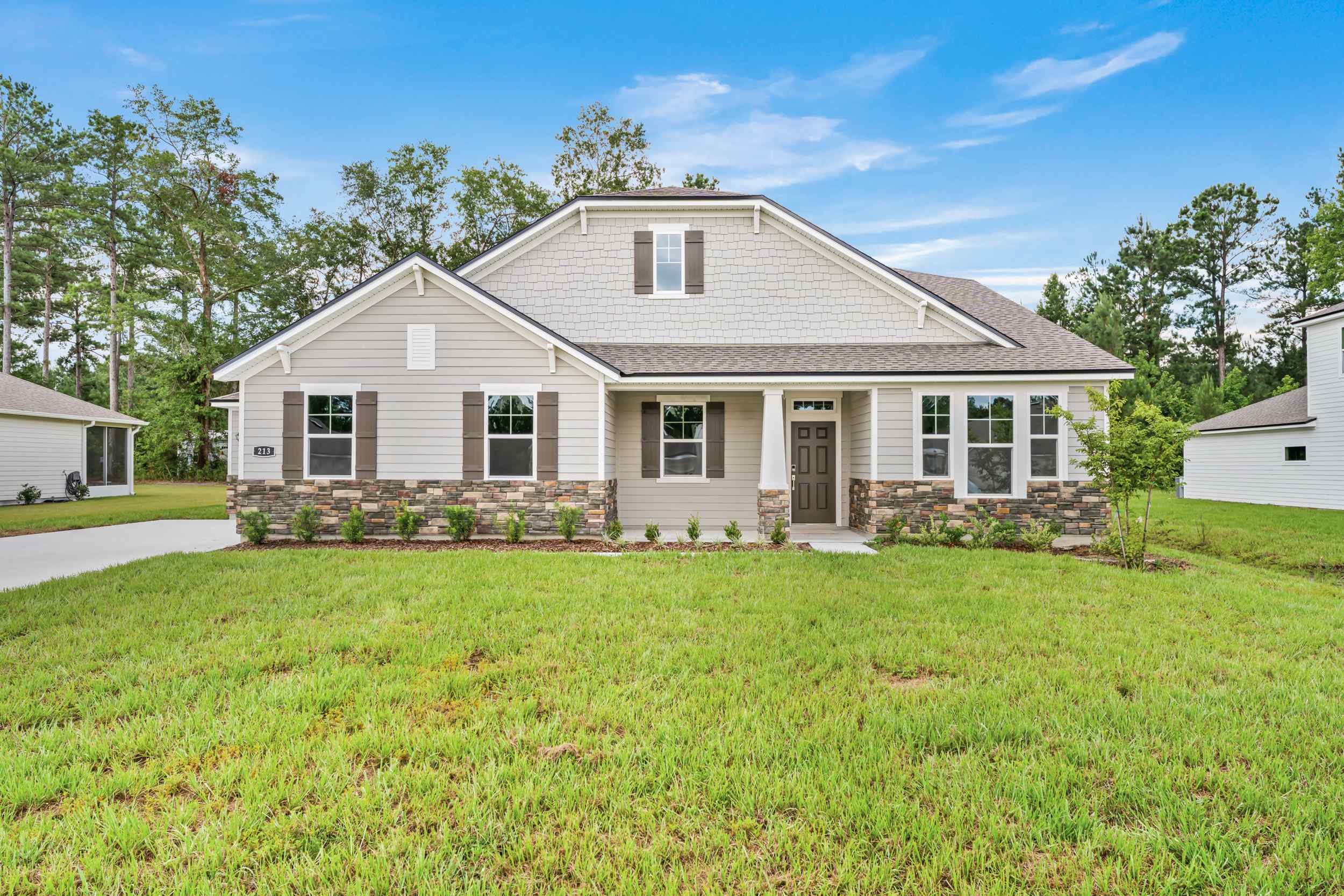 River Birch Lot 587 Front Exterior with Stone at NorthShore in Kingsland