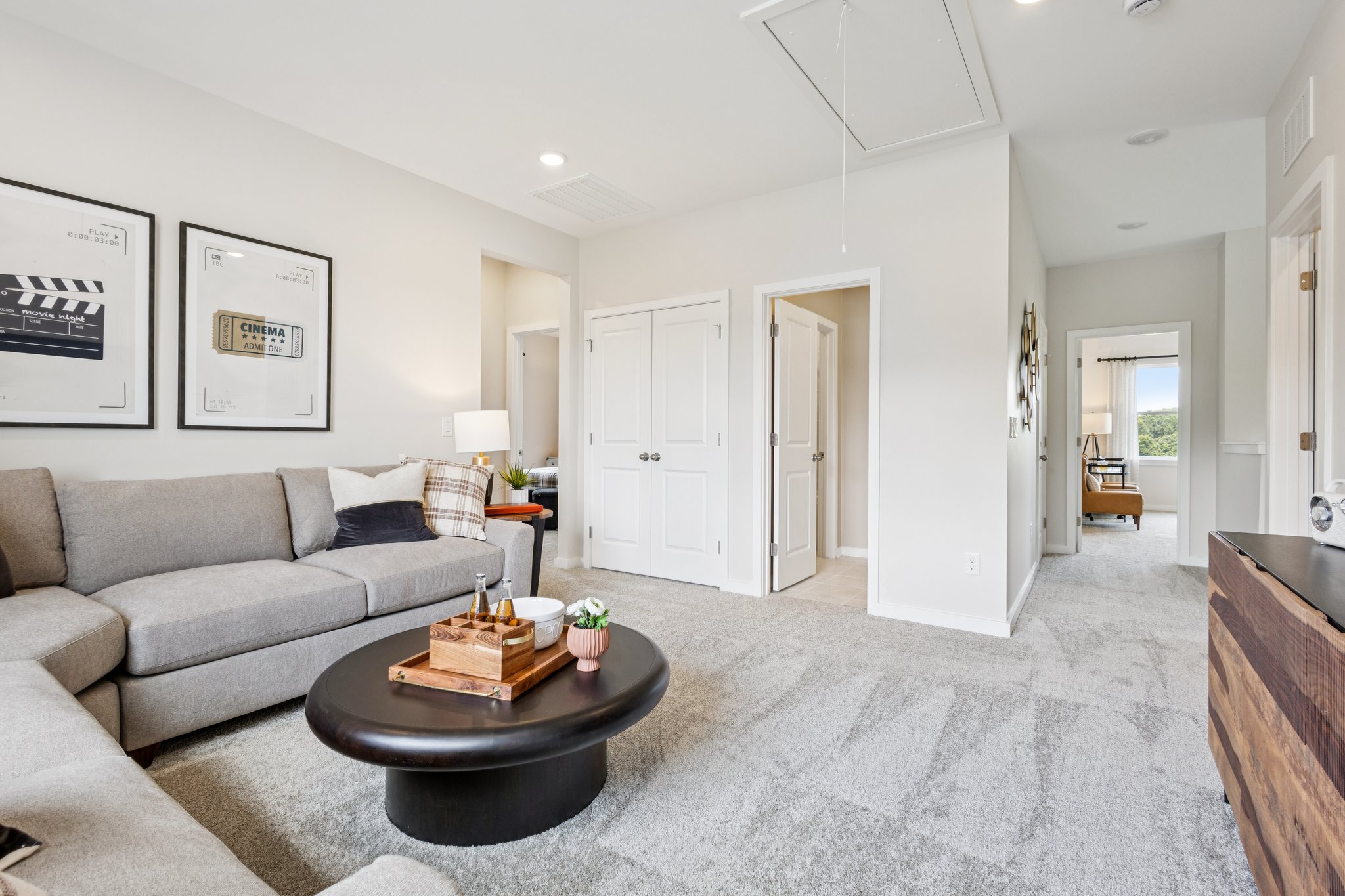 A living room with a couch and a coffee table.