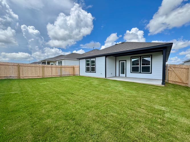 A house with a fence around it.