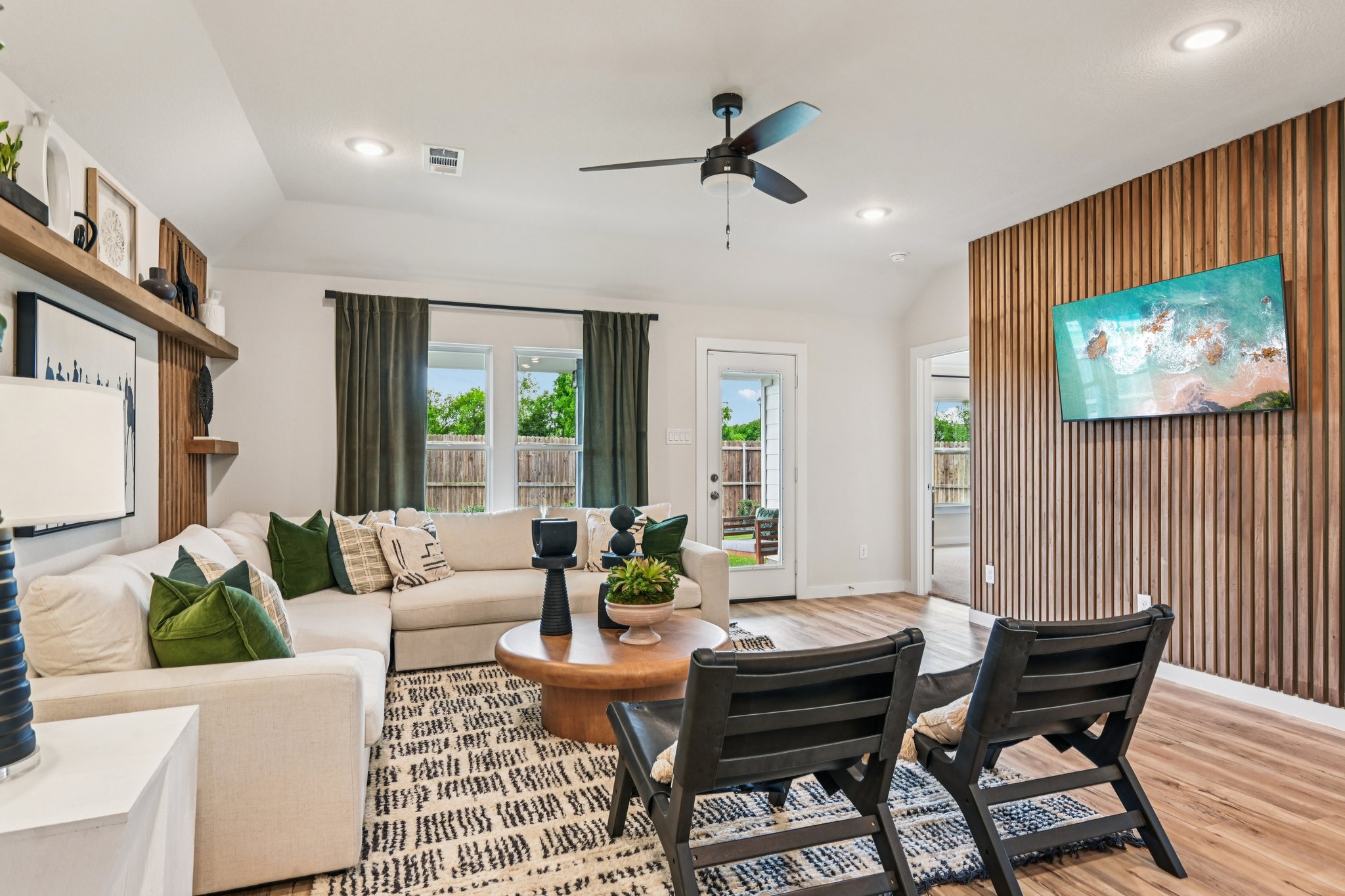 A living room with a large window.