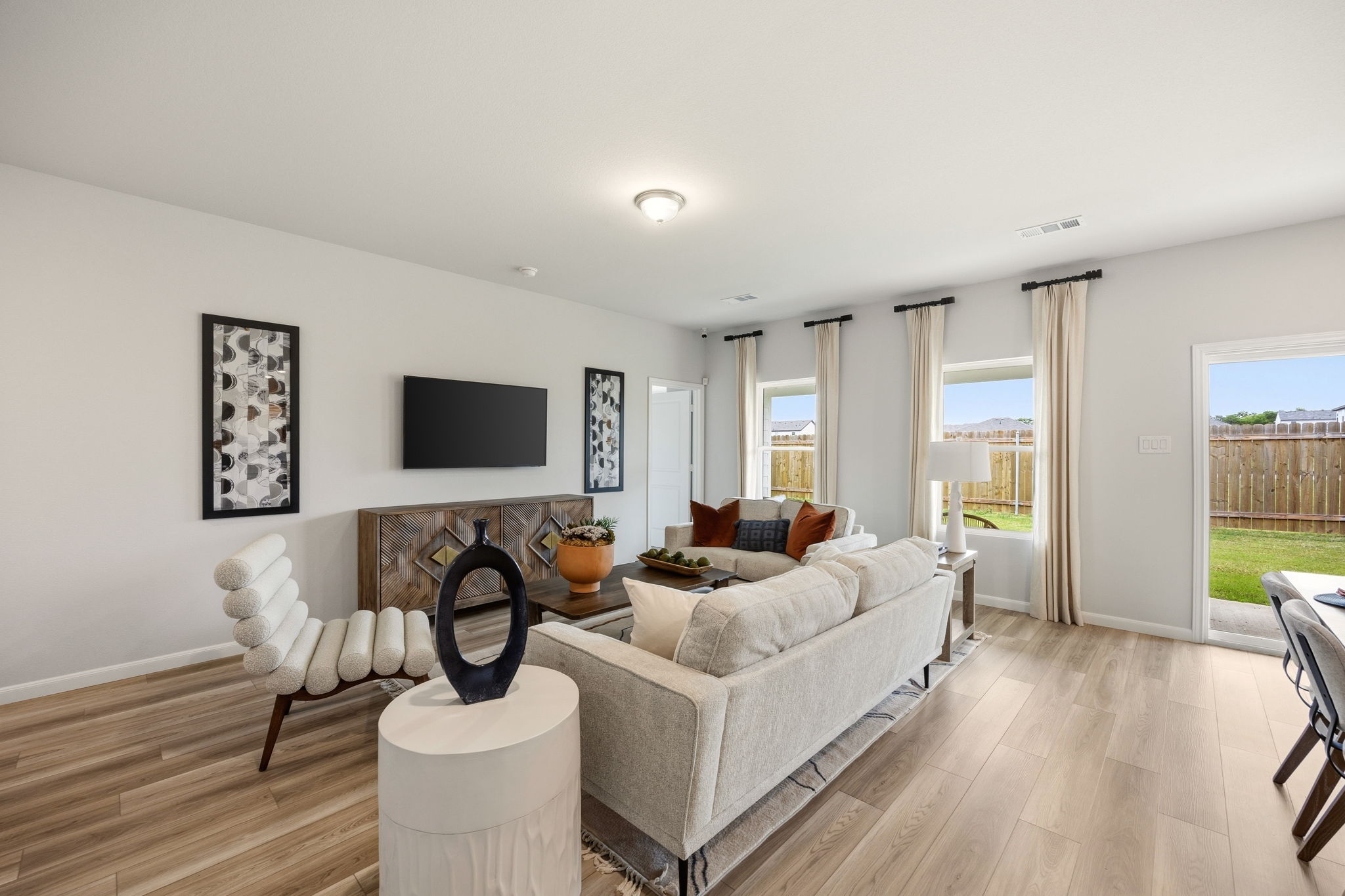 A living room with a large window.