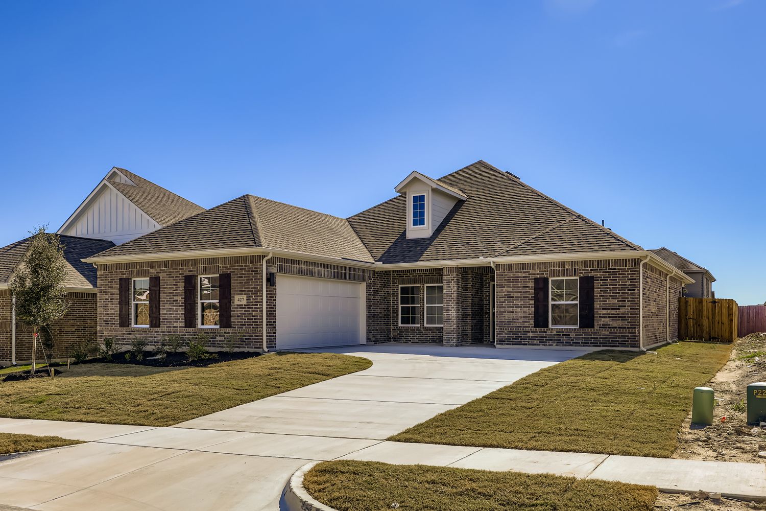 A house with a driveway.