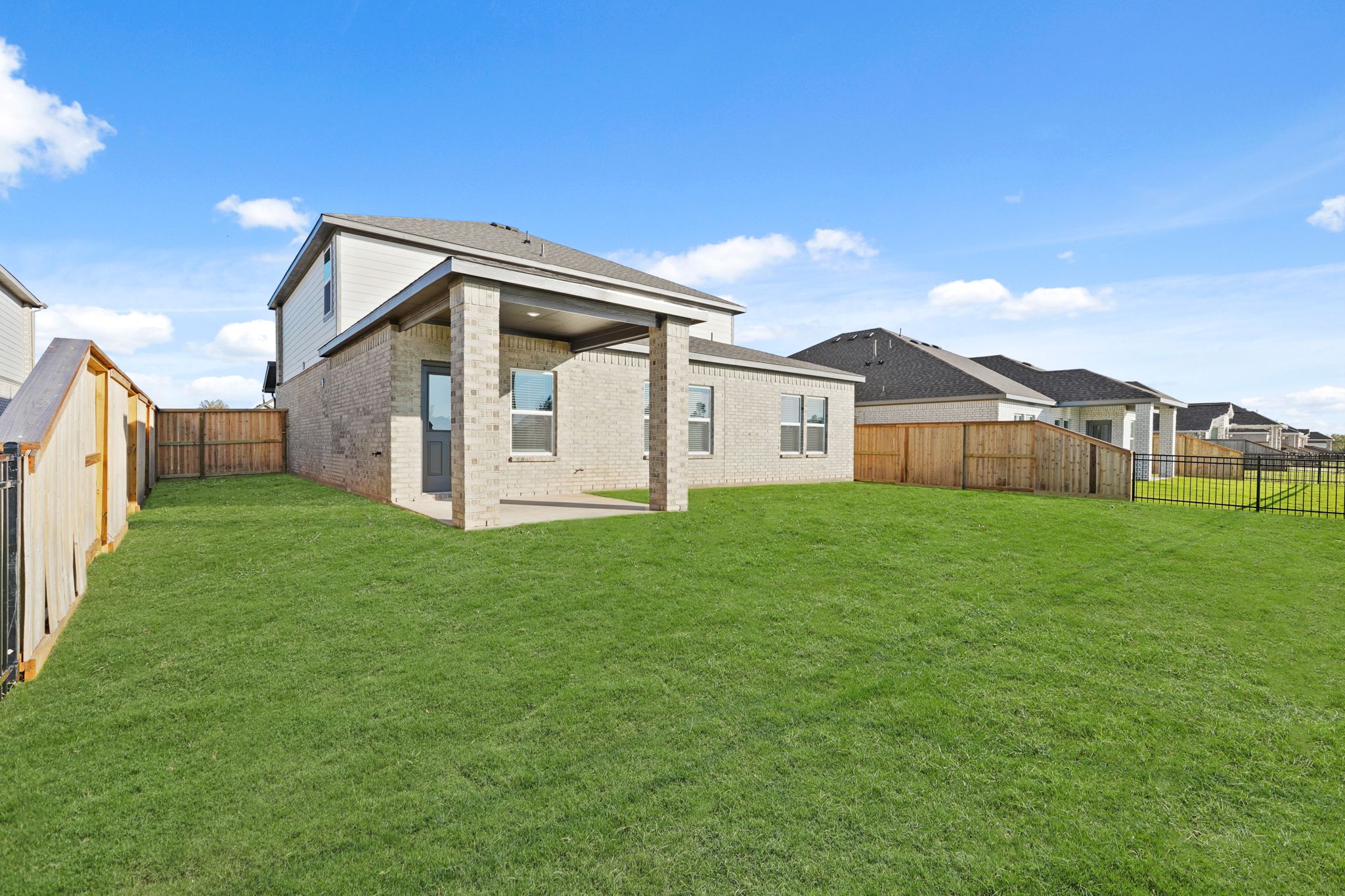 A house with a fence around it.