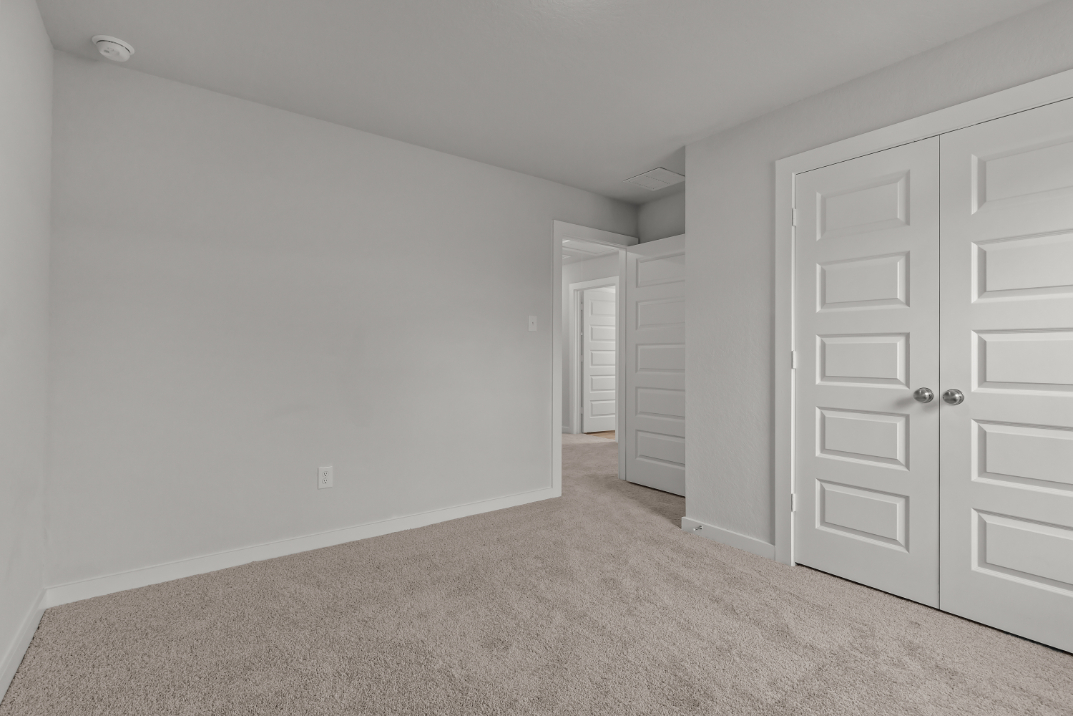 A room with white doors.