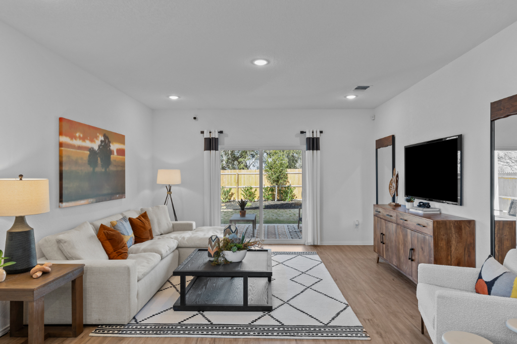 A living room with a large window.