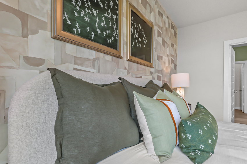 A couch with pillows.