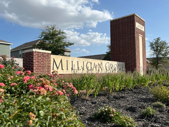 A sign in front of a building.