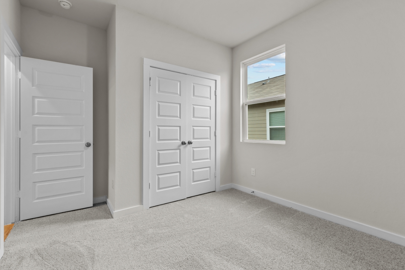 A room with white doors.