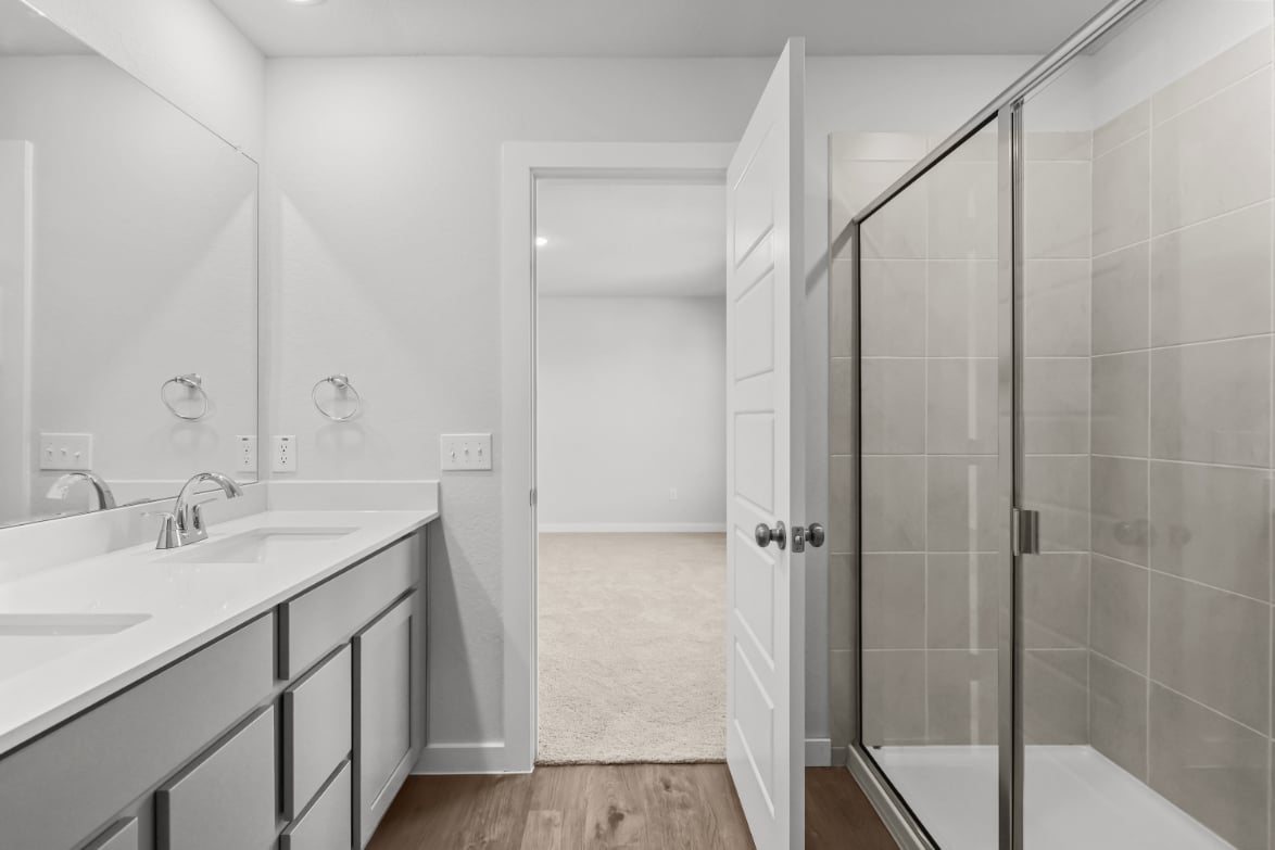 A bathroom with a glass shower.
