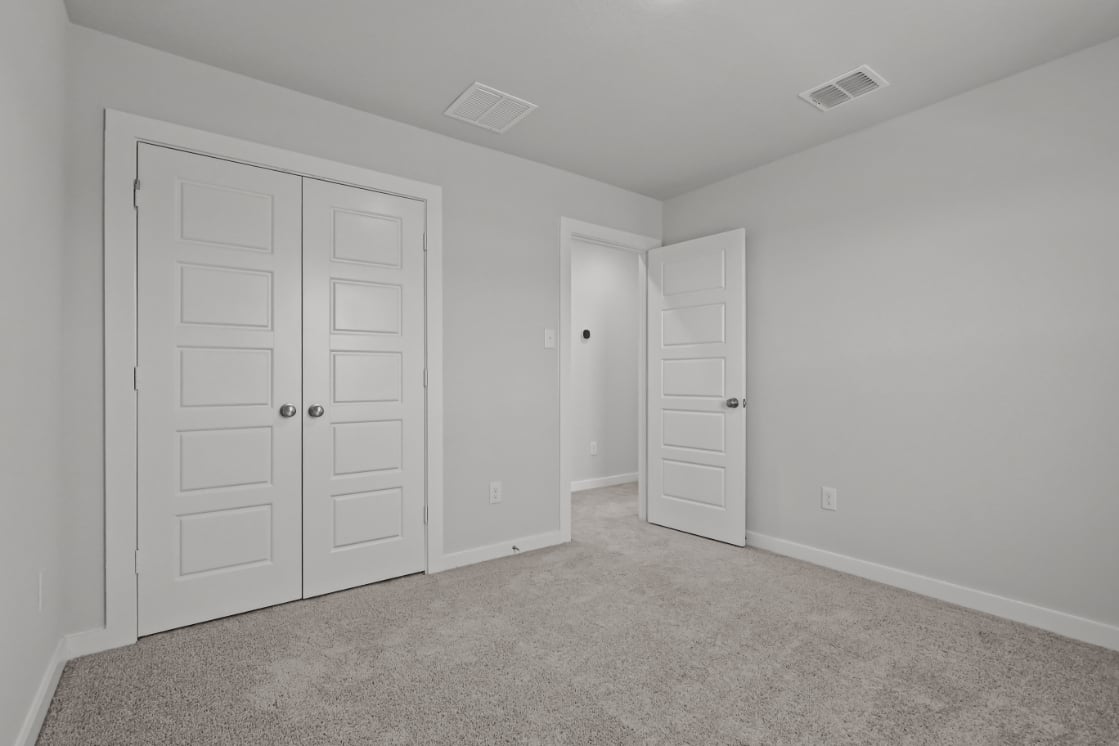 A room with white doors.