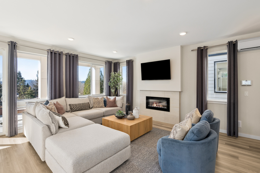 A living room with a fireplace.