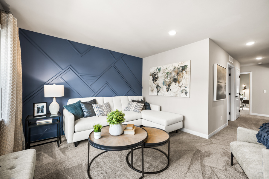 A living room with a couch and a coffee table.