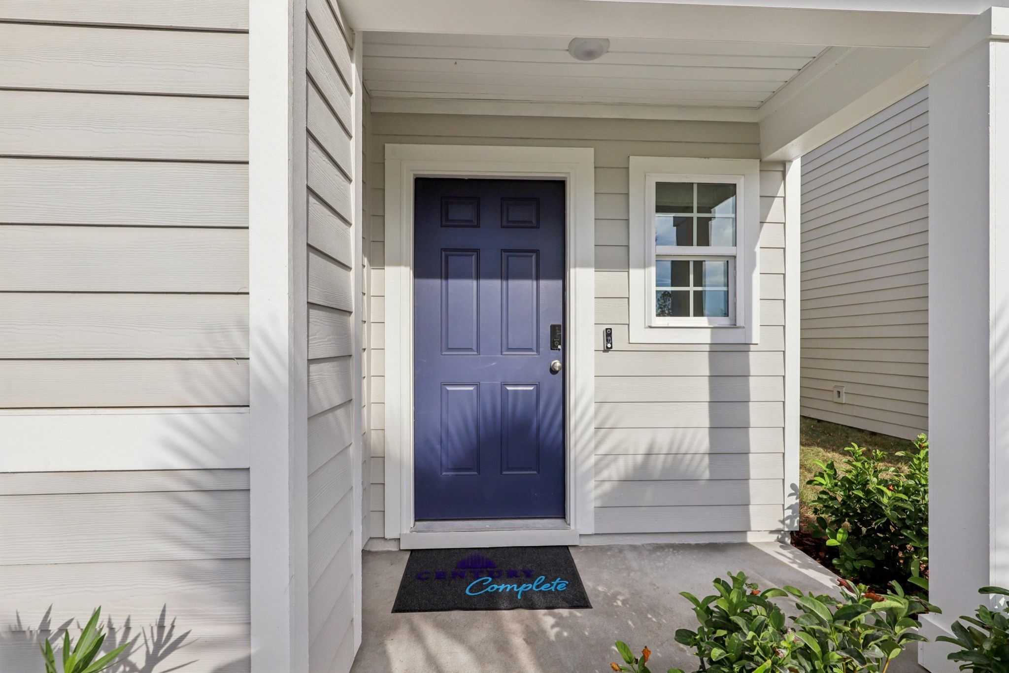 A blue door on a house.
