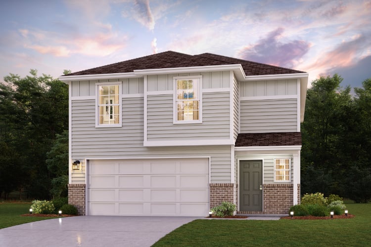 A white house with a garage.