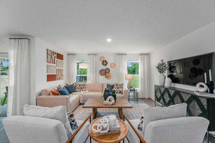 A living room with a couch and a coffee table.